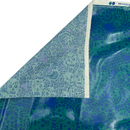 A close-up of patterned fabric with a diagonal fold showing two sides: one side has a light blue and teal paisley jacquard pattern, and the other side has a glossy blue and teal pattern. A white header band is visible at the top edge with the text '100% OLENO'.