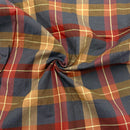 Plaid fabric with red, blue, and brown colors