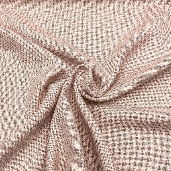 A close-up of light pink pendelton wool/silk/rayon blend fabric with a subtle woven pattern from the yarns being variations of pink. 