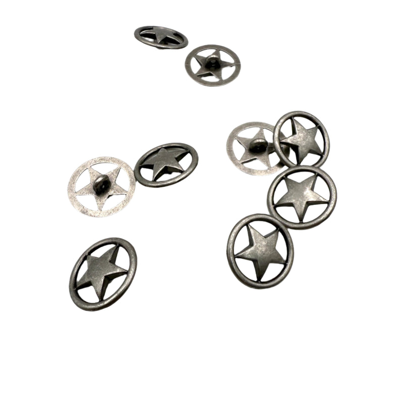 Star-shaped metal buttons on a white background