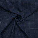 Navy blue linen fabric with a subtle check pattern italian deadstock