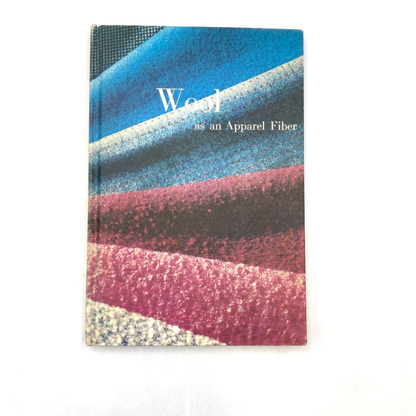 Front cover with a spread of wool samples