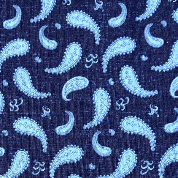 Light blue paisley and abstract designs on a deep blue background.