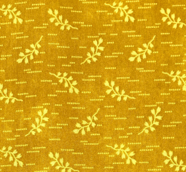 Yellow branches with leaves and dotted lines on a yellow orange background.