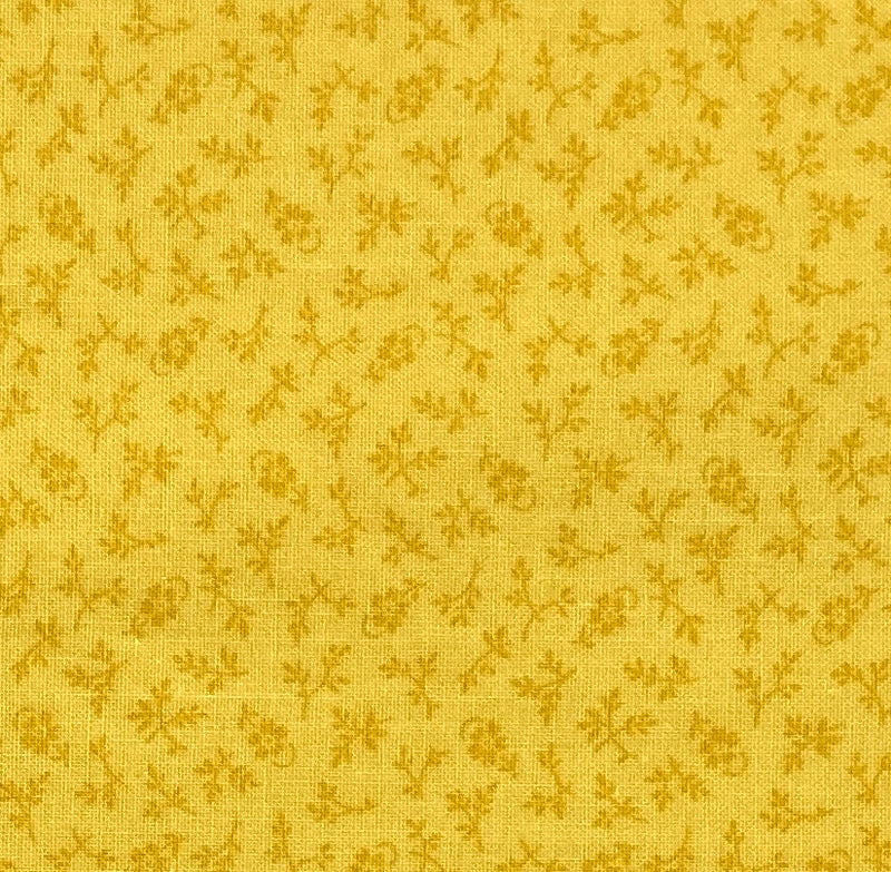 Dark yellow sprigs, branches and flowers on a light yellow background.