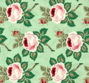 A 100% cotton quilting fabric featuring a sweet pink and red floral on a soft mint green background. 