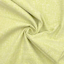 Close-up of light green fabric with a subtle texture