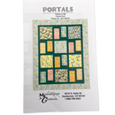 A quilt pattern named 'Portals' by Mountainpeak Creations, shown on a printed fabric with various patches of different patterns and colors, including green and multicolor floral designs.