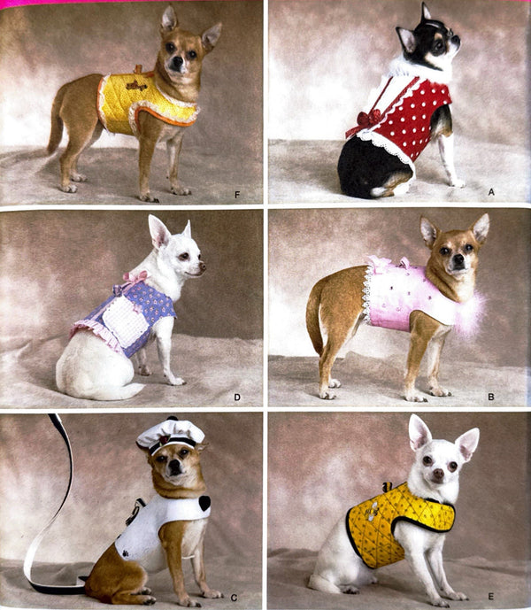Simplicity pattern packaging with images of dogs wearing various outfits.