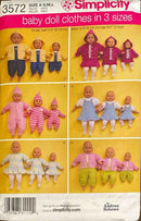 Simplicity pattern 3572 for baby doll clothes in various sizes on a yellow background.