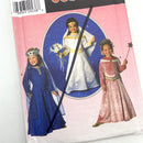 Packaging for a Simplicity 7795 kids' princess costume pattern showing illustrated images of girls in princess costumes and the costume patterns available.