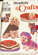 Simplicity Crafts sewing pattern for dog clothing and accessories on a white background