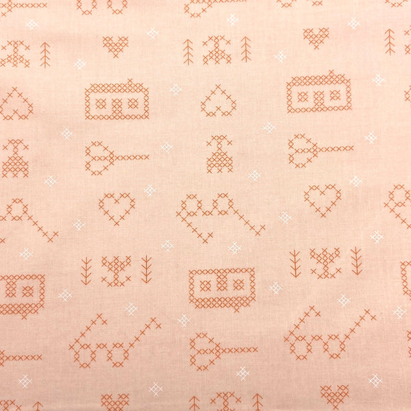 light pink cross stitch print quilting fabric