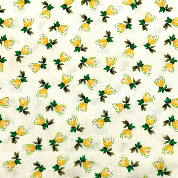 yellow floral quilting cotton with a white background