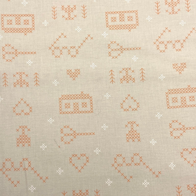 tan cross stitch print quilting cotton