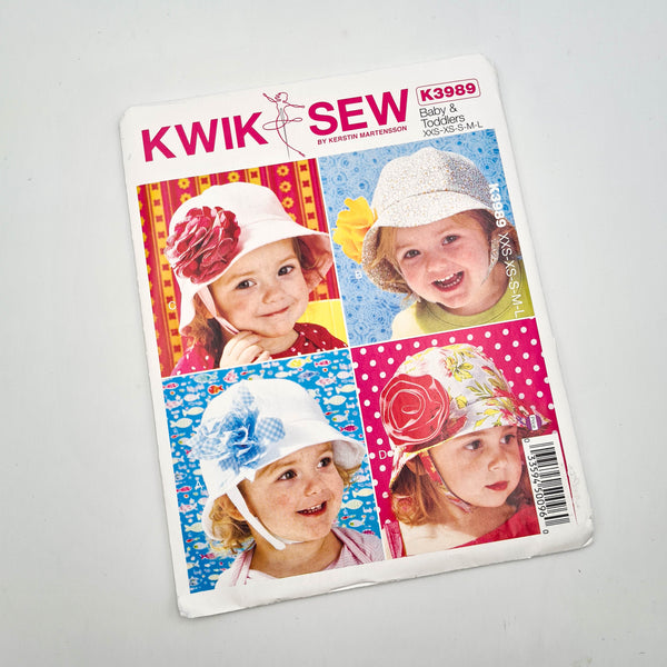 Kwik Sew 3989 | Baby + Toddlers Hats - Sizes XXS-XS-S-M-L | Uncut, Unused, Factory Folded Sewing Pattern