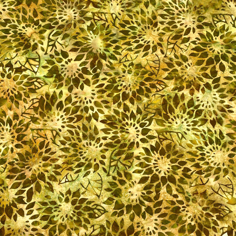 Close-up of a green and yellow mottled fabric with a brownish green floral design