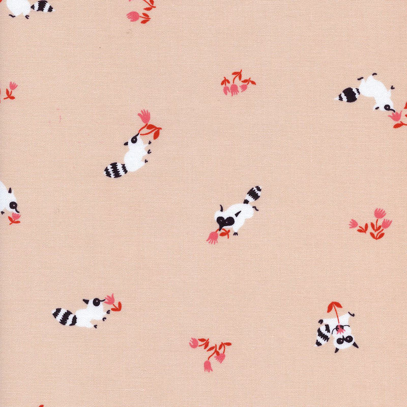 a close-up of a light peachy-pink fabric with little white raccoons sniffing pink flowers